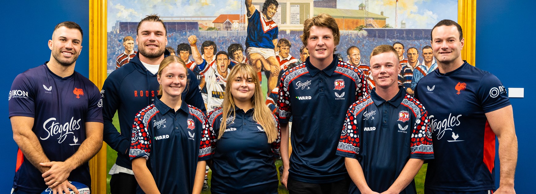 All Smiles: (L to R) James Tedesco, Angus Crichton and Boyd Cordner were presented hand-painted footballs by Erika Stoddard, Penelope Fisher, William Fry and Talan Higgins.