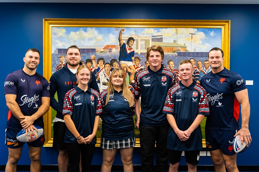 All Smiles: (L to R) James Tedesco, Angus Crichton and Boyd Cordner were presented hand-painted footballs by Erika Stoddard, Penelope Fisher, William Fry and Talan Higgins.